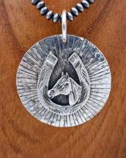 RICHARD SCHMIDT HORSE HEAD IN HORSESHOE PENDANT