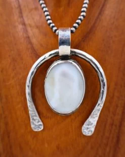 RICHARD SCHMIDT MOTHER OF PEARL OVAL NAJA PENDANT