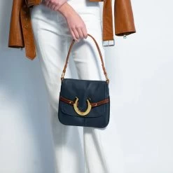 HAMPTON ROAD DESIGNS HUNTER BLUE HANDBAG -Western Fashion NavyHunteronModel2 700x.progressive fc25336e b172 4010 9f4d 4b79f63524b7