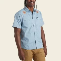 HOWLER MEN'S Crosscut Deluxe Shortsleeve Shirt -Western Fashion S23 SS Shirts Crosscut Deluxe SS Beach Blooms Blue Chambray Front 58c75713 f08d 4bf3 98b8 f1f03f2b03de