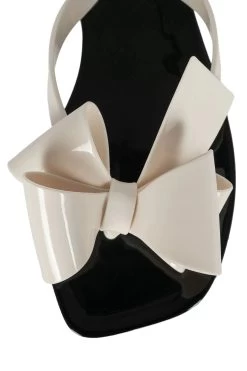 JEFFREY CAMPBELL SUGARY JELLY WITH BOW- CREAM SHINY -Western Fashion sugary flat sandal jeffrey campbell 842461 1365x a93d9c8a bafa 4524 af6f 7862b7209179